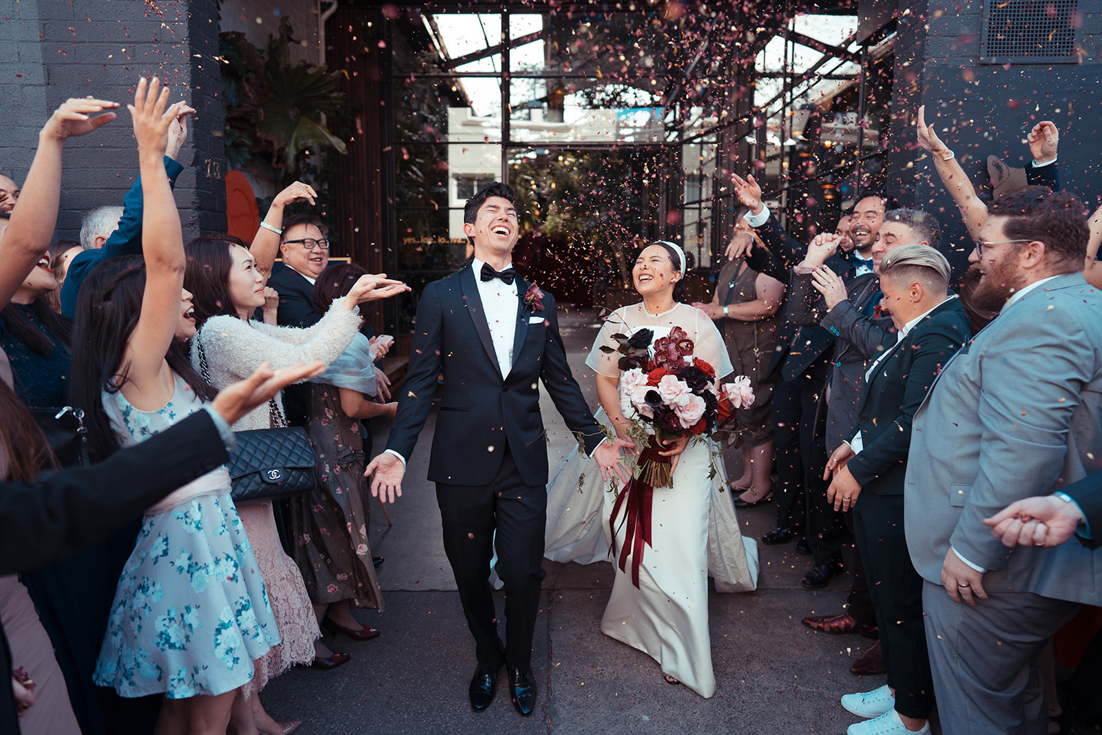 Bride and groom exit wedding at Rupert on Rupert with confetti