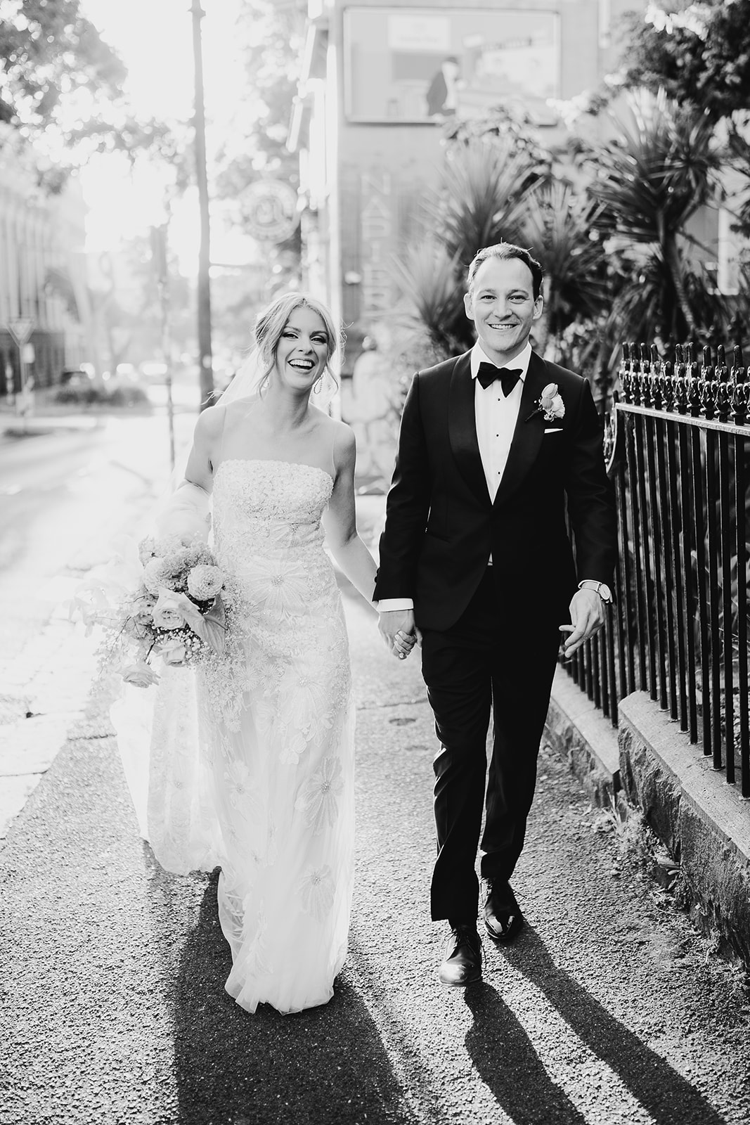 wedding couple waling the streets in Collingwood Melbourne