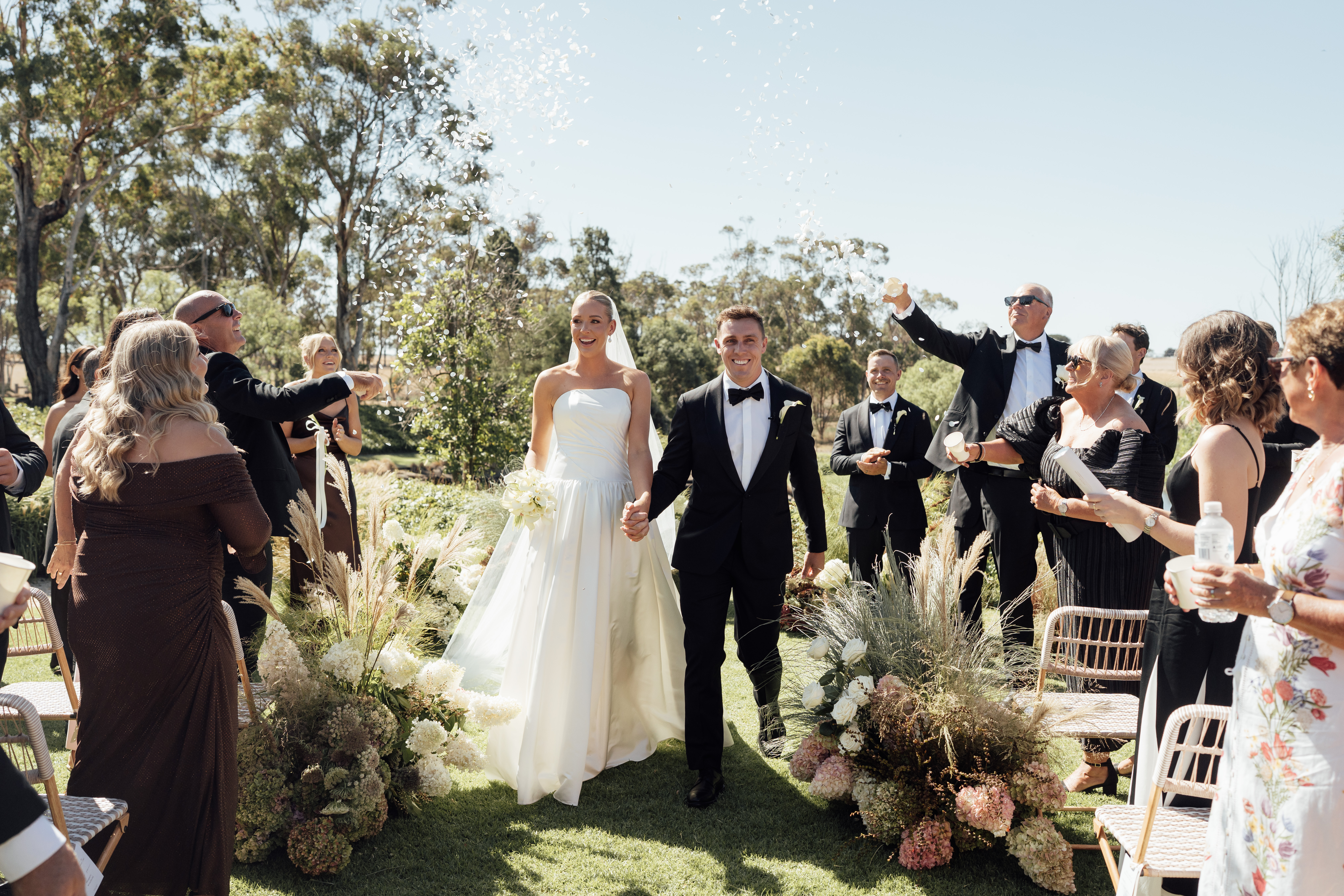 Bride and groom after their outdoor wedding ceremony in the gardens at Barunah Plains Geelong