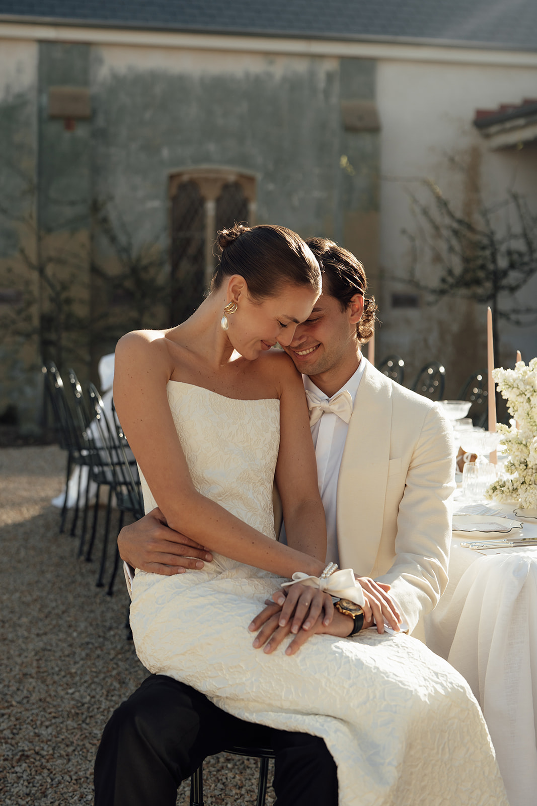 Bride and groom share a moment in the Piazza at sunset at Sunnyside Estate wedding venue 