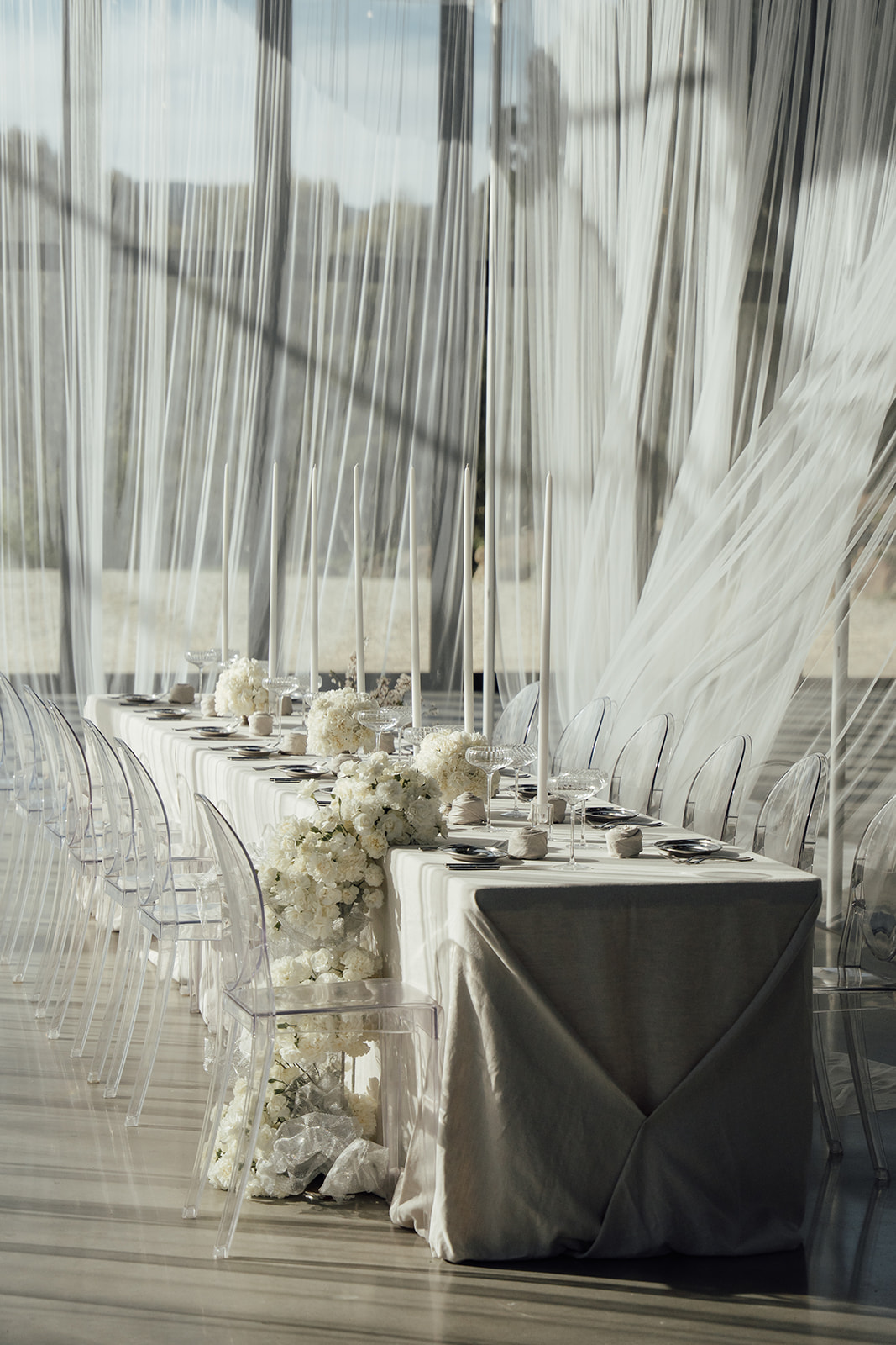 Wedding reception styling, table and draping in the glass atrium at Alora Macedon 