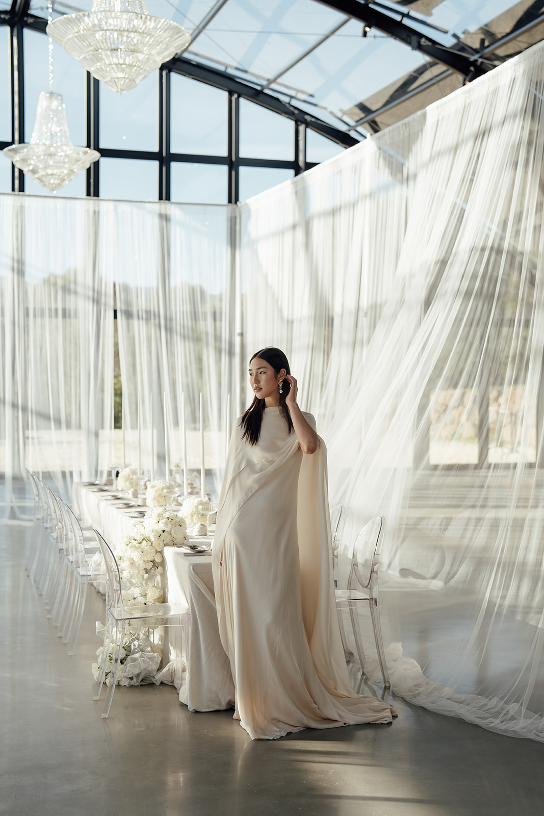 Bride in the Glass atrium at Alora Macedon wedding venue