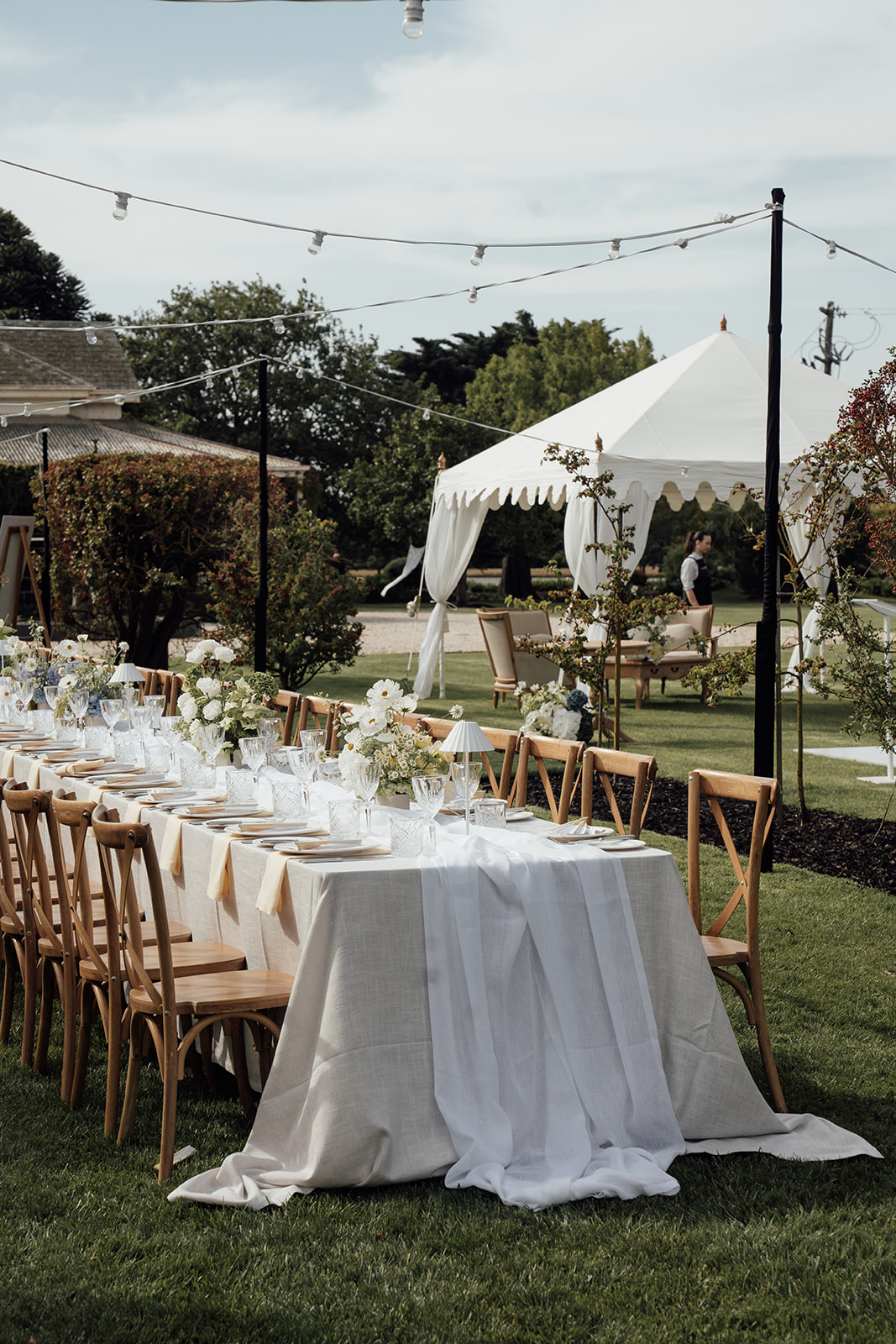 Rosemont Homestead reception table under festoon lighting